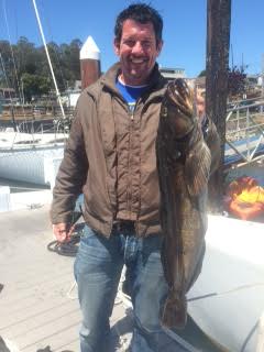 man with ling on dock