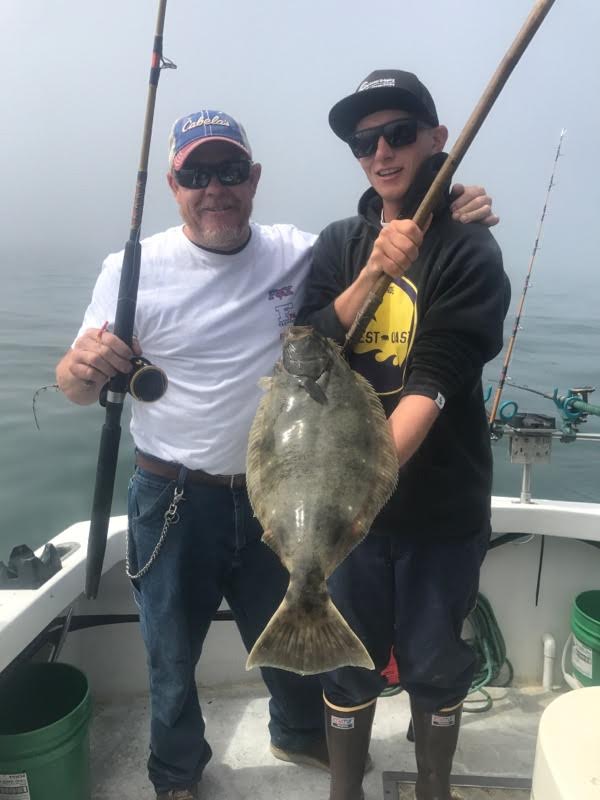 Marshall and Brody with halibut