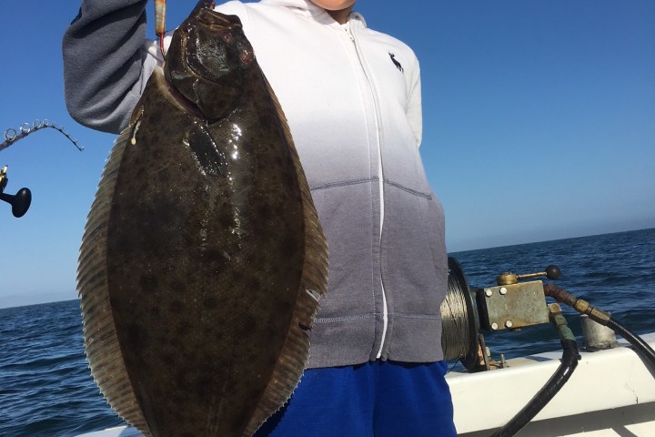 boy with halibut